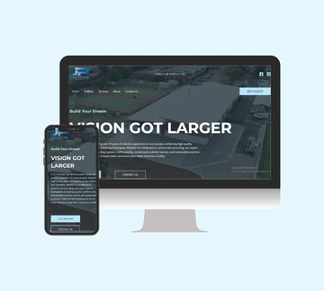 A computer monitor and smartphone display the same website homepage with the headline VISION GOT LARGER in large text; the background appears to show an aerial view of a building or construction site.