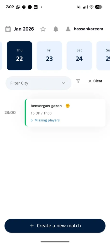 Mobile screen showing a calendar for January 2026, highlighting Thursday the 22nd. An event at 23:00 for bensergaw gazon is listed, costing 15 Dh for 1 hour, with 6 missing players. Create a new match button is at the bottom.
